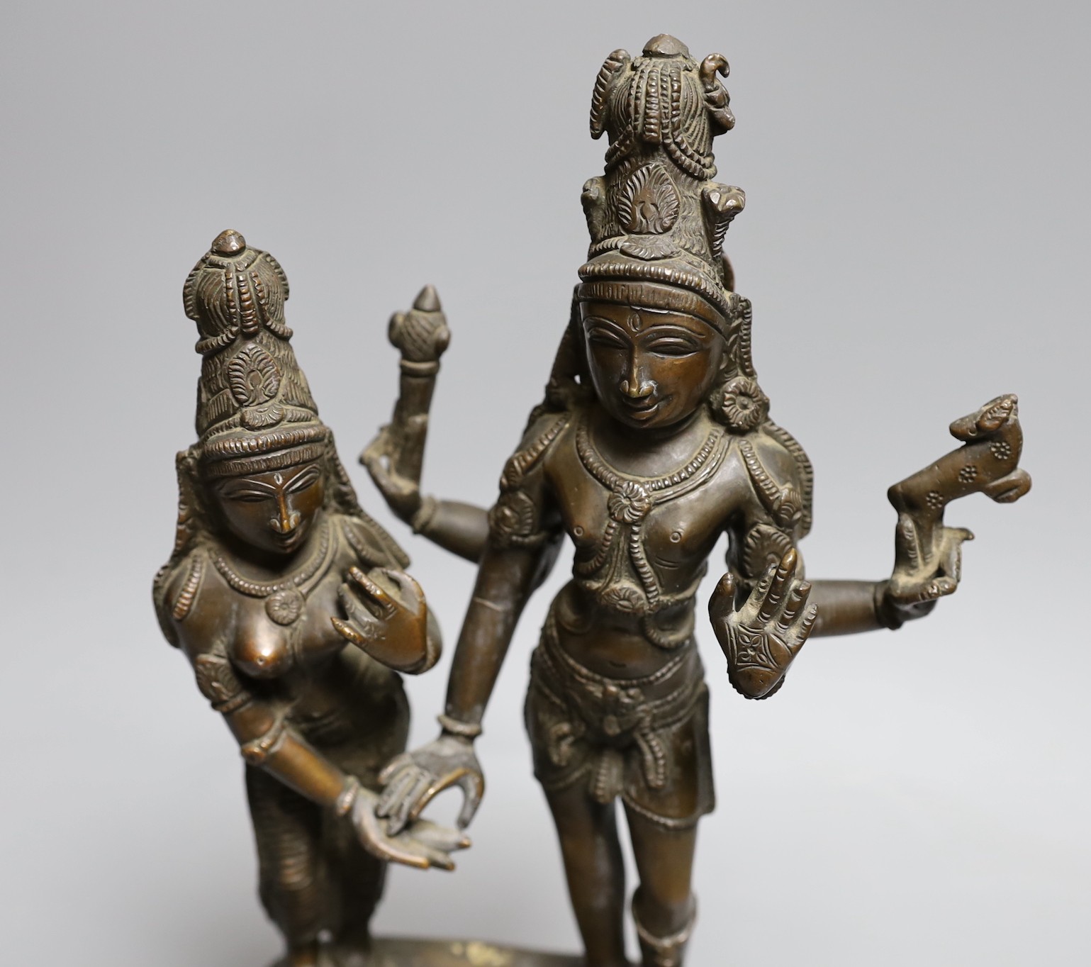 An Indian bronze group Shiva and Pavarti, early 20th century, 33cms high